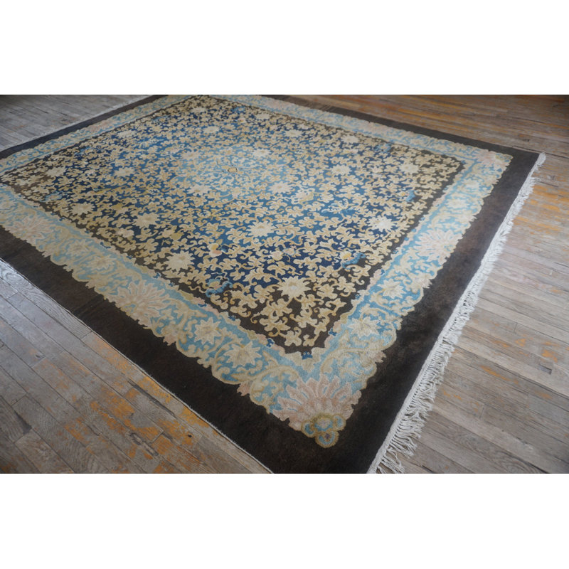 Tapis chinois antique à motif floral noué à la main des années 1920