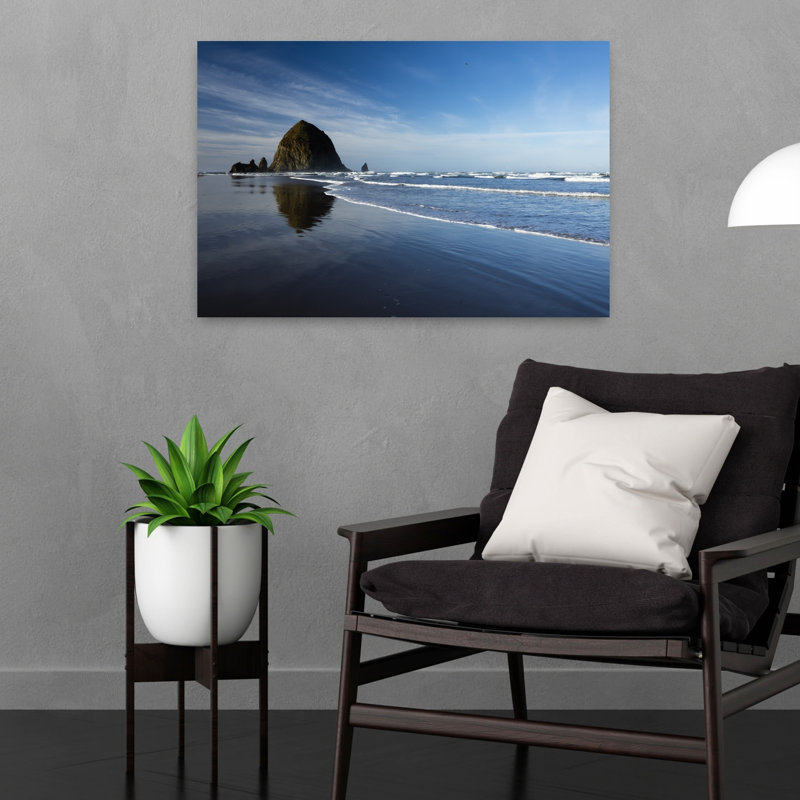 View Of Rock Formations Close To Coastline Cannon Beach Oregon USA by Dan Merkel - Wrapped Canvas Print