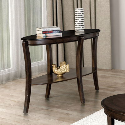 Table de canapé ovale de style traditionnel avec tablette de rangement inférieure ouverte et pieds courbés, finition noyer