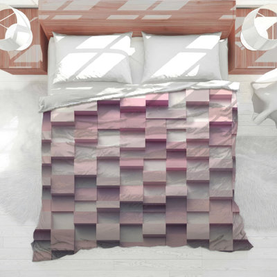Édredon rose à blocs superposés