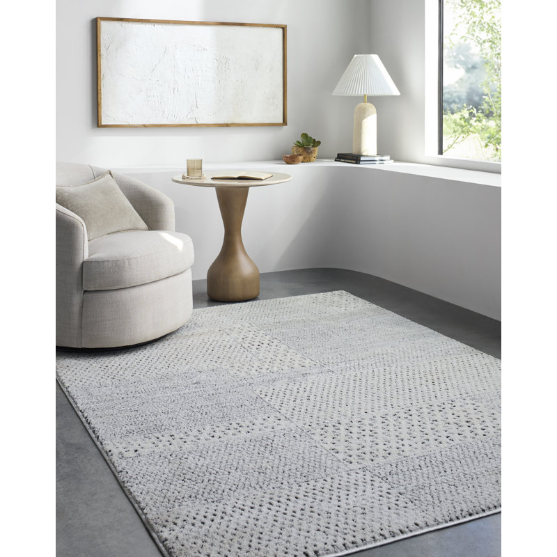 Ivory and Black Geometric Patchwork Area Rug, 6'7" x 9'