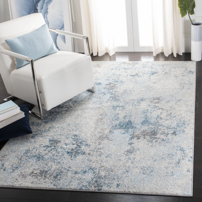 Eslick Ivory/Blue Area Rug
