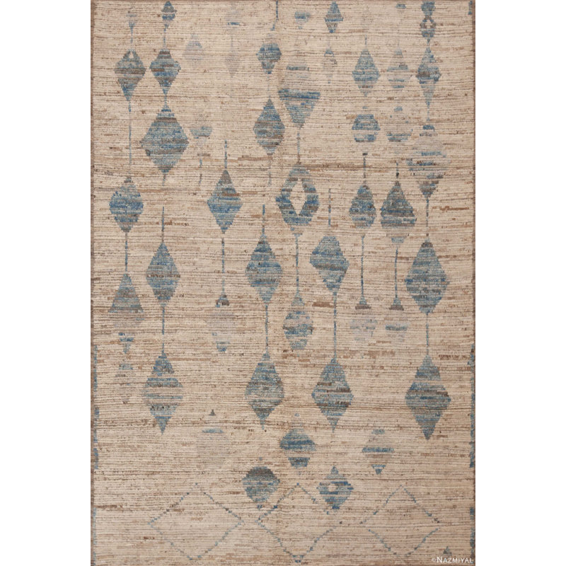 Tapis moderne ivoire / crème / bleu clair à motif géométrique tribal
