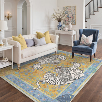 Teiarra Tigris Animal Print Machine Washable Blue / Yellow Indoor Area Rug with Non-Slip Backing