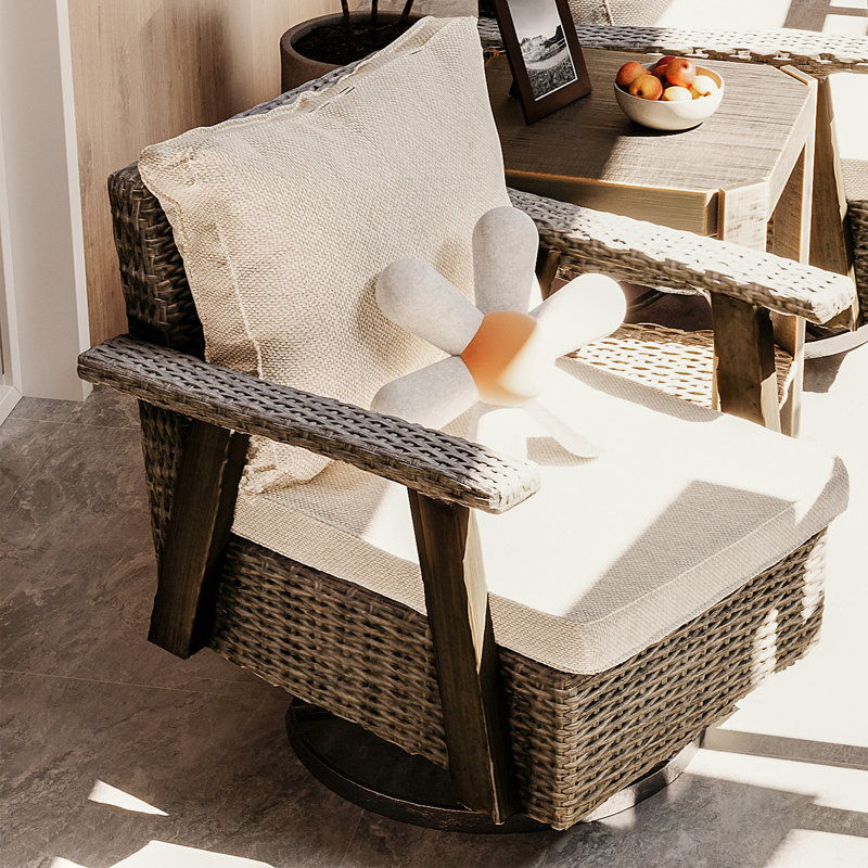Chaise d'extérieur en osier à bascule en polyéthylène (PE) avec coussins Cleora, Beige