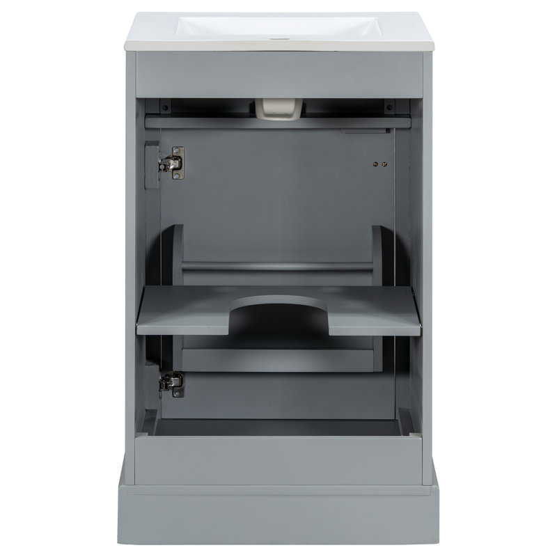 Meuble-lavabo de 20 pouces avec lavabo en céramique, porte à fermeture douce, tablette réglable et support de rangement fixé à la porte