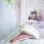 Housse de coussin en lin à boutons
