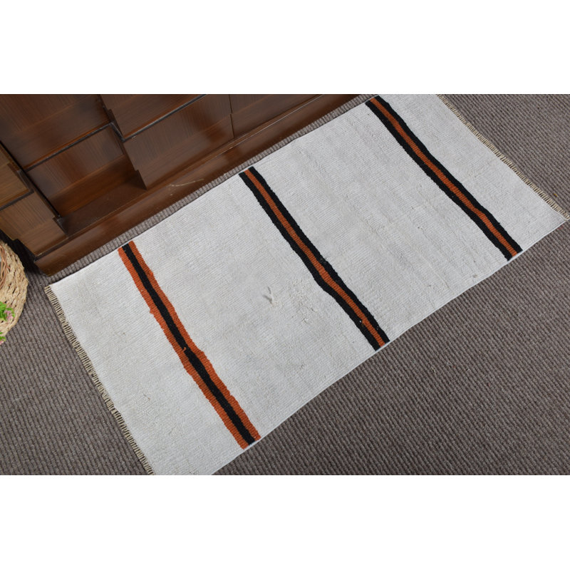 Tapis de porte turc fabriqué à la main dans un style rétro avec des rayures blanches et oranges frappantes