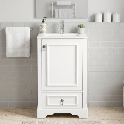 Meuble-lavabo autoportant de 51 cm (20 po) en bois massif et MDF blanc avec lavabo en céramique, quincaillerie à fermeture amortie et tablette réglable en forme de U