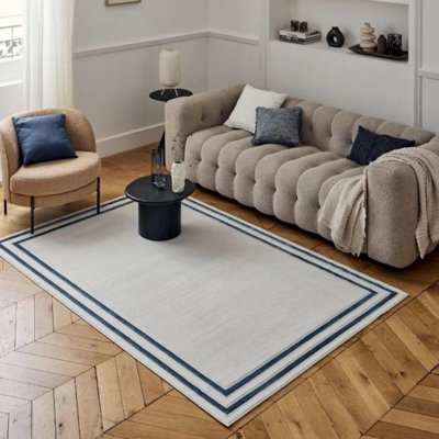 Carmel Modern Bordered Cream/Navy Area Rug