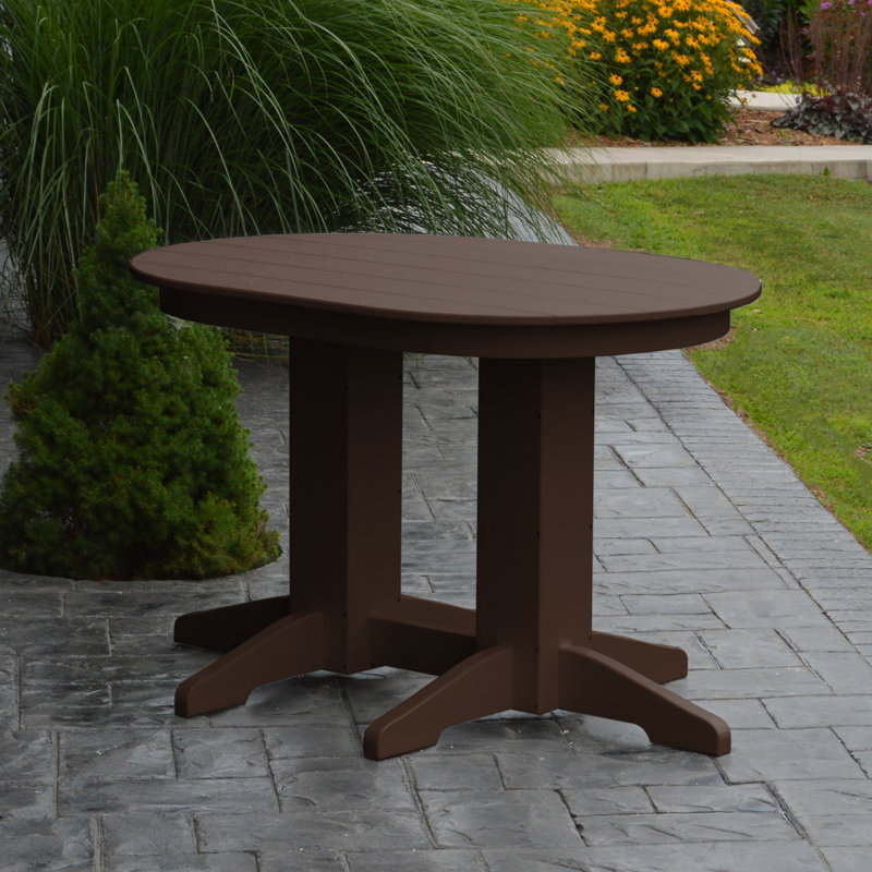 Nettie Oval Outdoor Dining Table With Umbrella Hole , in. W 33'' in. D, Tudor Brown, 33" W x 60" L x 32" H
