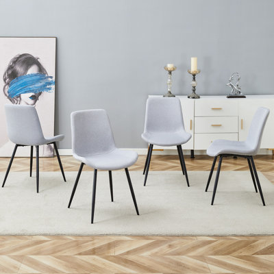 Light Gray Artificial Leather Backrest Cushion Dining Chair, Black Metal Legs,Curved Widened Cushion Design For More Comfort,Suitable For Restaurants, Kitchens, Bedrooms, Offices.