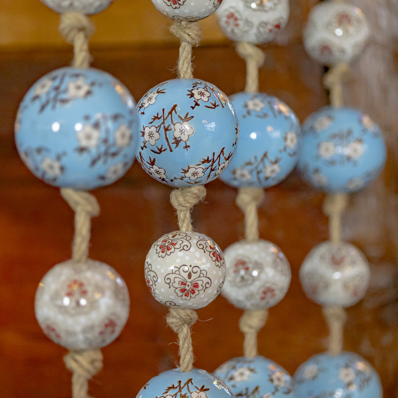 Suspension murale boule en porcelaine Tsugo, Bleu / ivoire / rose