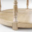 Grande table basse ronde avec repose-pieds | Plateau capitonné, pieds en bois rétro et tablette de rangement ouverte