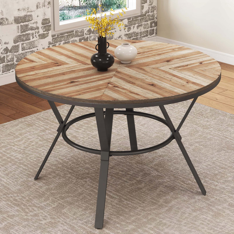 Table de salle à manger ronde avec pieds en tréteaux en métal noir