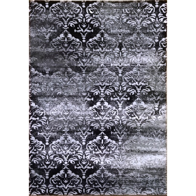Tapis à motif géométrique noir Godley