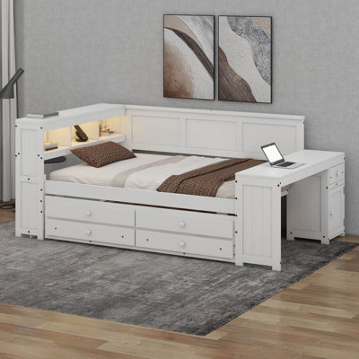 Lit de coin pleine grandeur avec tiroirs de rangement et lit gigogne en L avec bureau