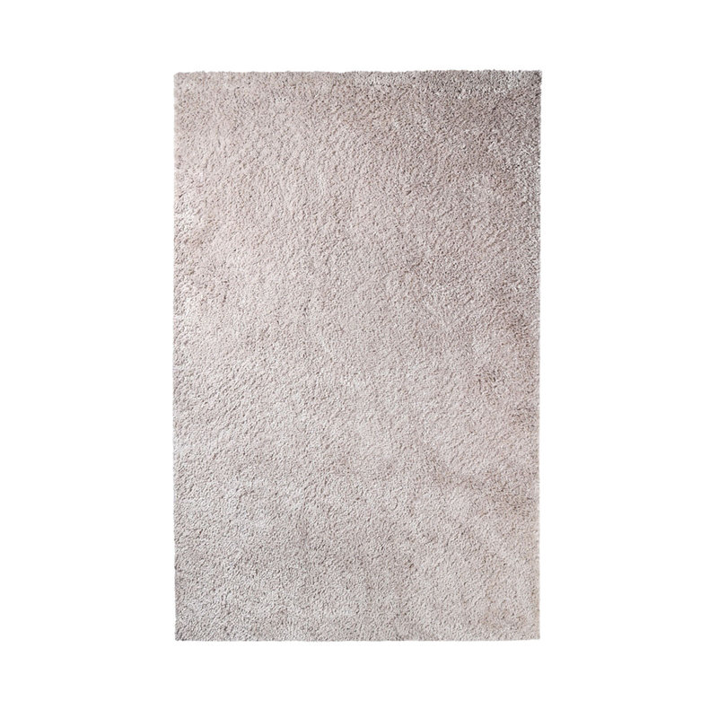 Tapis beige à poils longs résistant aux taches