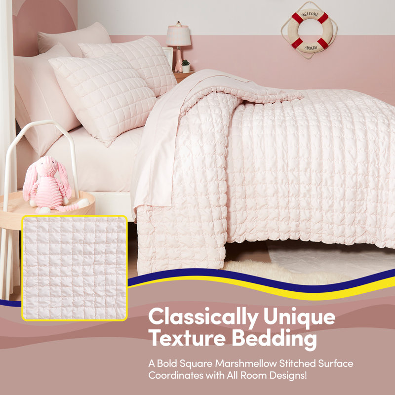 L'ensemble de literie Marshmellow Poufs Solid Kids comprend un ensemble de draps de Sweet Home Collection®, Lit double