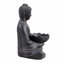 Bouddha méditant avec pot de fleurs de lotus