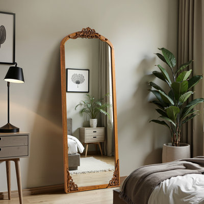 Miroir rétro avec cadre sculpté