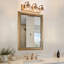 Éclairage pour meuble-lavabo rétro 22,8 pouces à finition laiton à trois lumières 22,8 pouces-124572234-134671675
