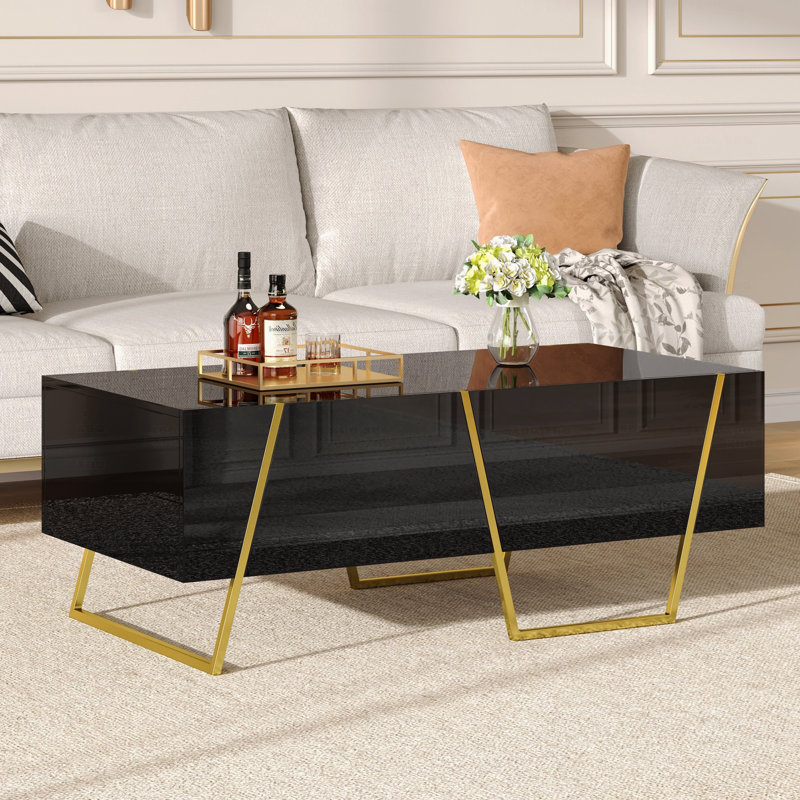 Table basse 47,2 "moderne rectangulaire ultrabrillante pour le salon avec rangement et base dorée 4 tiroirs