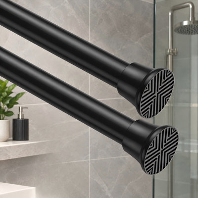 This 2pack of black spring-loaded tension rods adjusts from 18-36 inch; the extendable short curtain rods are intended for closets, curtains, and kitchens.