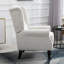 Fauteuil à oreilles confortable avec coussins capitonnés et accoudoirs arrondis pour un style de vie élégant-954303318