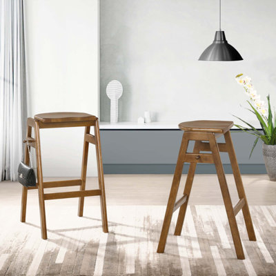 Tabouret de comptoir Weidler avec structure en bois massif