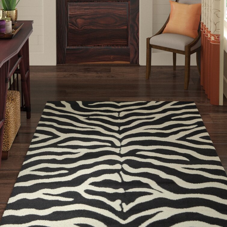 Testerman Animal Print Black Area Rug 5’3”x8’0”: