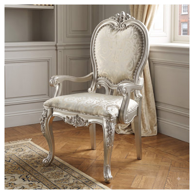 Chaises de salle à manger Celestia Champagne avec accoudoirs rembourrés, garniture cloutée et sculptures florales (ensemble de 2)