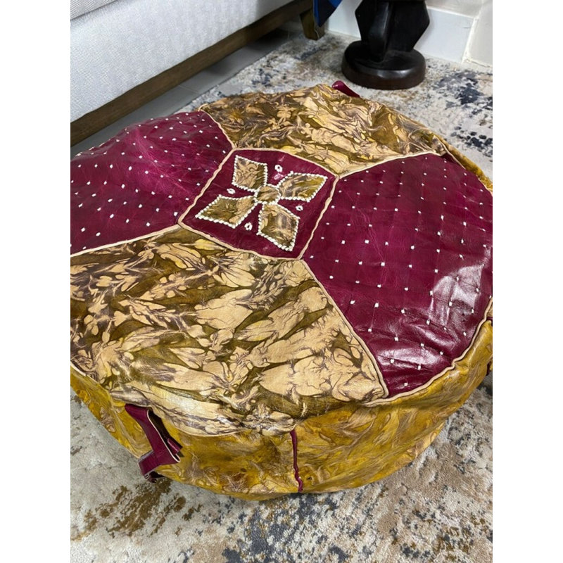 Pouf rond en cuir véritable Conswello