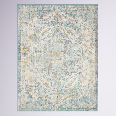 Tapis oriental crème ivoire / bleu sarcelle / jaune Hillsby