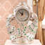 Horloge de sol décorative vintage élégante en or rose, ornée d'une sculpture de paon.-1863146984