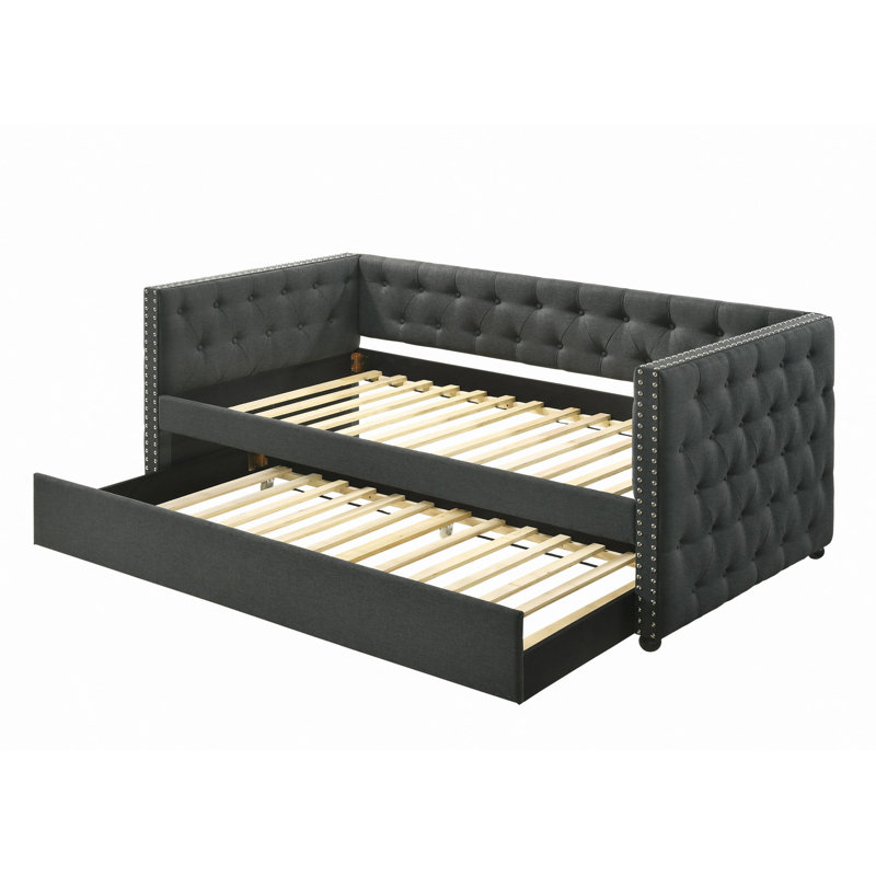 Lit de jour en tissu gris avec couchette