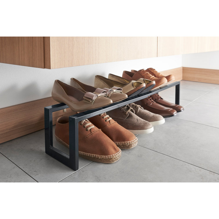 https://assets.wfcdn.com/im/94892379/resize-h755-w755%5Ecompr-r85/2248/224814454/Yamazaki+Home+Adjustable+Shoe+Rack%2C+Small%2C+Steel%2C++Holds+4+to+8+shoes%2C+Expandable%2C+Stackable.jpg