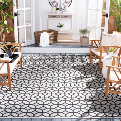 Tapis d'intérieur / extérieur à motif géométrique Mitchum Performance