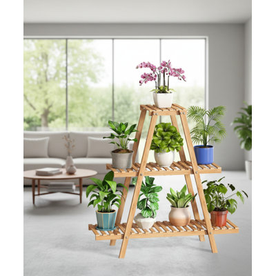 This Three-Tiered Bamboo Trapezoidal Shelf Can Hold Eight Potted Plants And Is Suitable For Both Indoor And Outdoor Use, As Well As Various Settings S by George Oliver