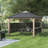 Sunjoy Wood Gazebo 11 x 11 ft. Hardtop Gazebo Cedar Wood Framed Hot Tub Gazebo with Steel and Polycarbonate Hardtop and bar Shelf