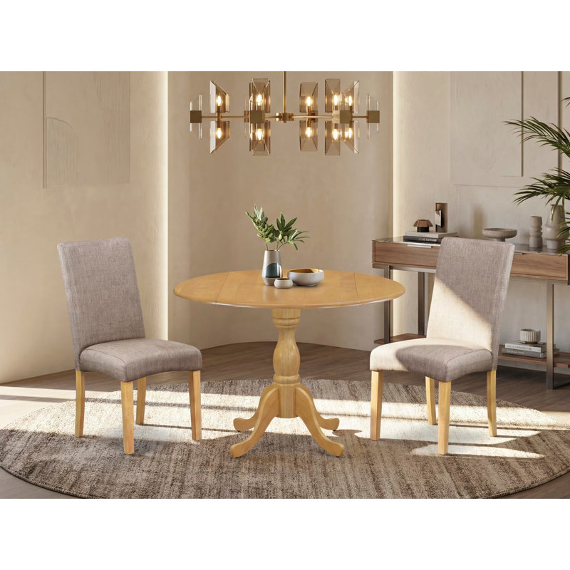 L'ensemble de table de salle à manger 3 pièces comprend une table de cuisine ronde avec Dropleaf et 2 chaises de salle à manger Parson en tissu kaki foncé, chêne