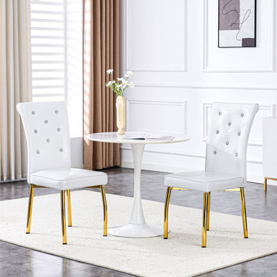 Set of 2 Retro Alligator‑Textured Upholstered Dining Chairs, Featuring Crystal Buckle Accents & Faux‑Leather Upholstery. Bring a touch of elegance and mystery to your dining space with gilded metal le