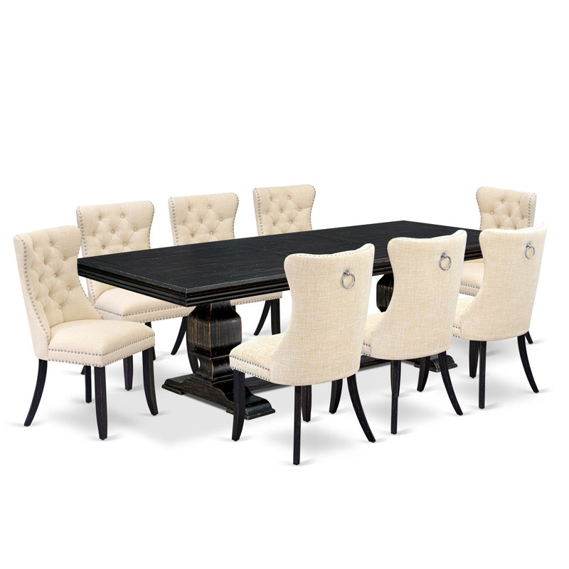 Cet ensemble de salle à manger 9 pièces se compose d'une table en bois et de 8 chaises de salle à manger en tissu de polyester beige clair avec dossier capitonné à boutons - finition noire sablée.
