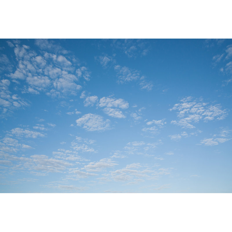 Clouds in Blue Sky by Martin Barraud, 20" H x 30" W