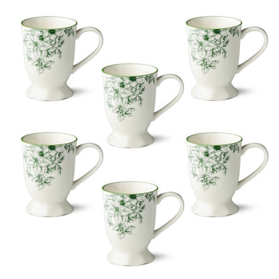 Ensemble de 6 tasses Winter Evergreen - Six tasses assorties en porcelaine blanche de 16 onces habillées d'une toile botanique vert forêt, apportant une élégance fraîche à chaque gorgée chaude de la saison.