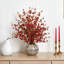 Arrangement floral de fleurs de cerisier artificielles dans un vase