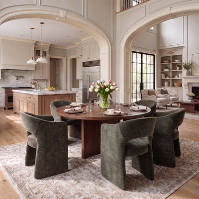 Ensemble de salle à manger rond de 7 pièces avec table à piètement central, placage de bois et fauteuils en chenille