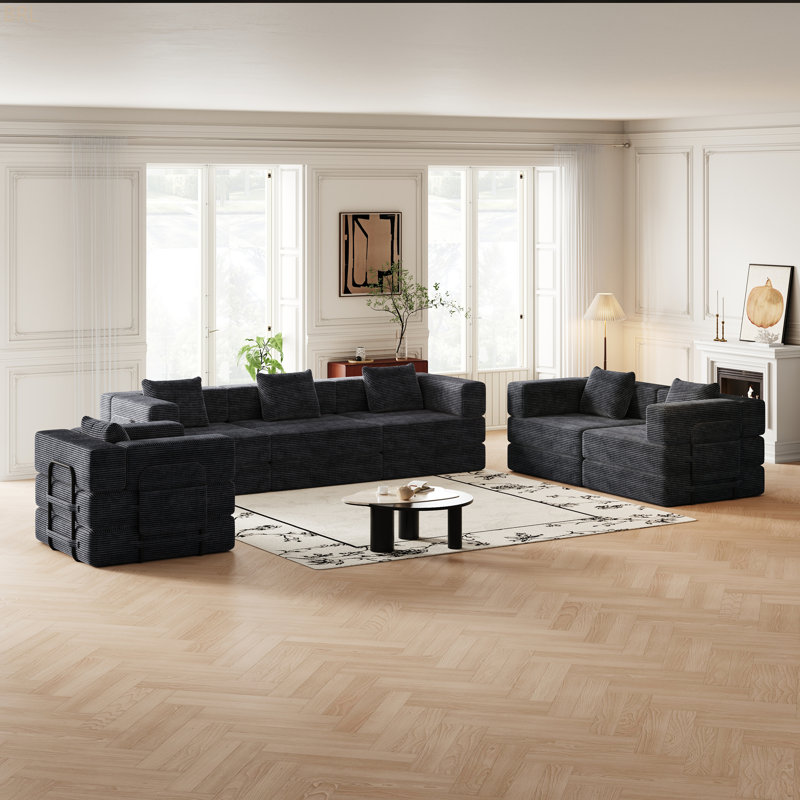 Canapé-lit convertible en velours côtelé avec mousse haute densité, coussins antidérapants et conception compacte pour un confort moderne et polyvalent.