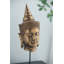 Tête de statue de Bouddha sur pied