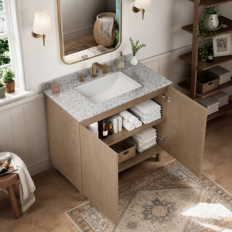 Meuble-lavabo avec comptoir en granit, lavabo en céramique et finition imitation bois Heidelberg pour une salle de bain élégante et fonctionnelle.